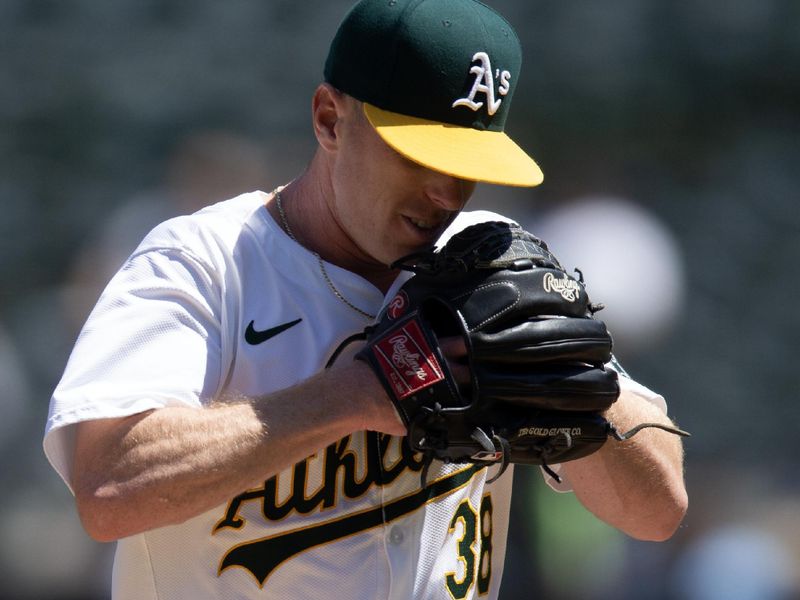 May 8, 2024; Oakland, California, USA; Oakland Athletics starting pitcher JP Sears (38) reacts to being pulled for a reliever during the sixth inning against the Texas Rangers at Oakland-Alameda County Coliseum. Mandatory Credit: D. Ross Cameron-USA TODAY Sports