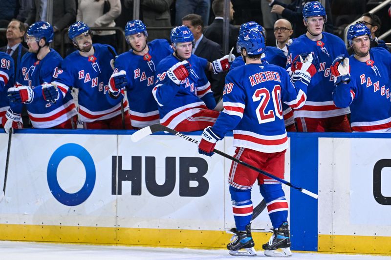 Dec 2, 2024; New York, New York, USA;  New York Rangers left wing Chris Kreider (20) celebrates his goal against the New Jersey Devils during the second period at Madison Square Garden. Mandatory Credit: Dennis Schneidler-Imagn Images