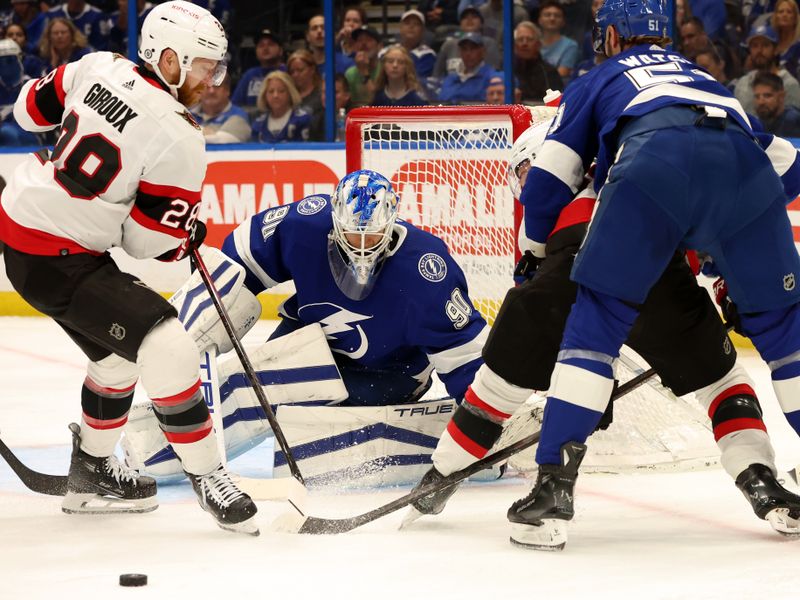 Apr 11, 2024; Tampa, Florida, USA; Tampa Bay Lightning goaltender Matt Tomkins (90) defends Ottawa Senators right wing Claude Giroux (28) during the second period at Amalie Arena. Mandatory Credit: Kim Klement Neitzel-USA TODAY Sports