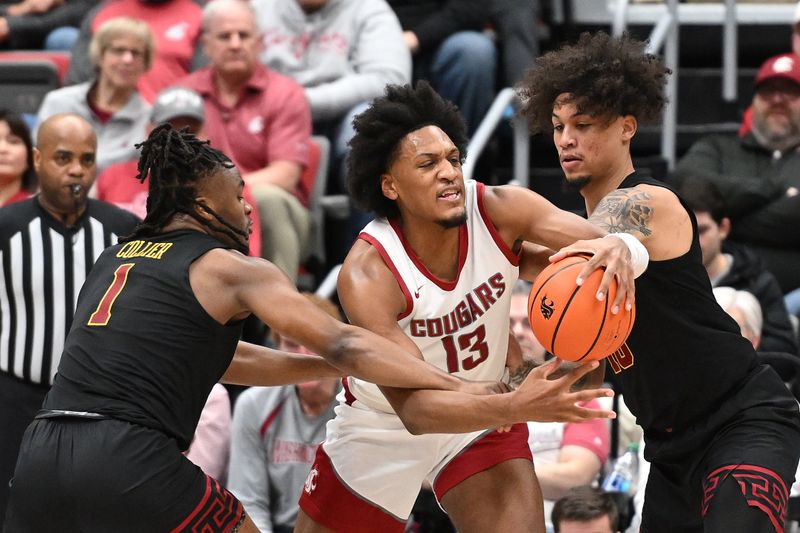Feb 29, 2024; Pullman, Washington, USA; Washington State Cougars forward Isaac Jones (13) is fouled by USC Trojans guard Isaiah Collier (1) in the second half at Friel Court at Beasley Coliseum. Washington State Cougars won 75-72. Mandatory Credit: James Snook-USA TODAY Sports