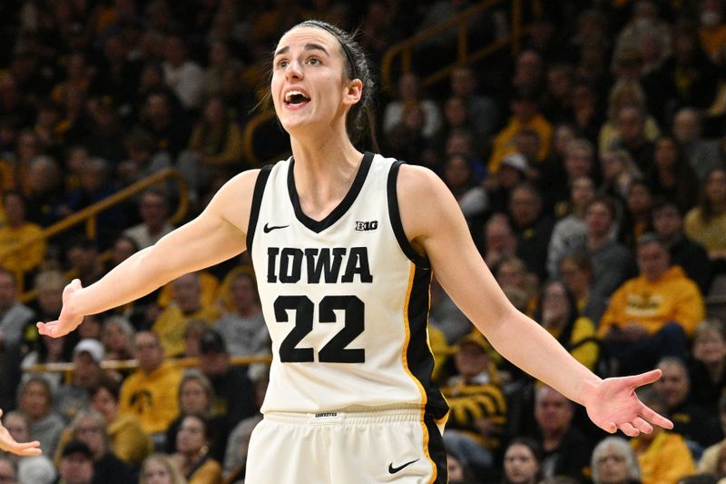 Feb 8, 2024; Iowa City, Iowa, USA; Iowa Hawkeyes guard Caitlin Clark (22) reacts during the first half against the Penn State Nittany Lions at Carver-Hawkeye Arena. Mandatory Credit: Jeffrey Becker-USA TODAY Sports