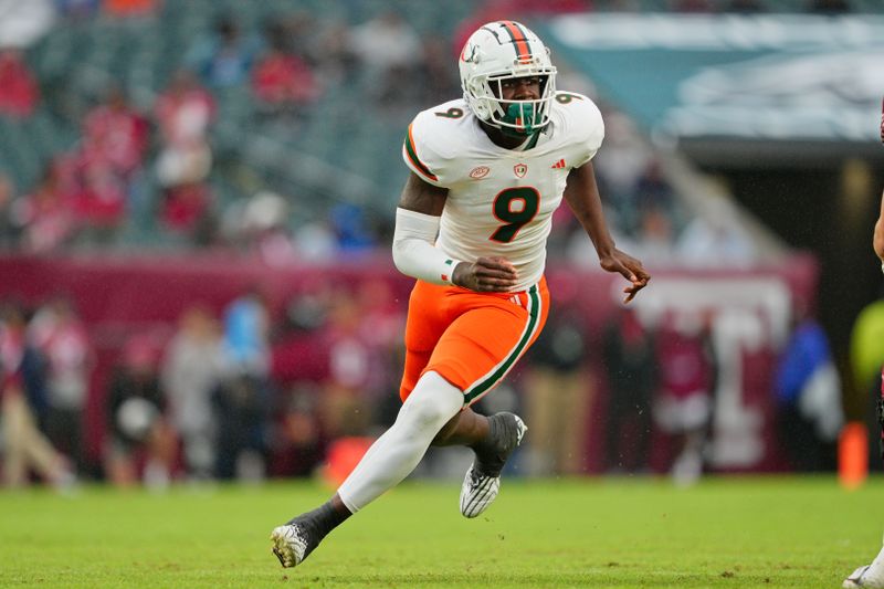 Sep 23, 2023; Philadelphia, Pennsylvania, USA;  Miami Hurricanes defensive lineman Nyjalik Kelly (9) rushes in the second quarter against the Temple Owls at Lincoln Financial Field. Mandatory Credit: Andy Lewis-USA TODAY Sports