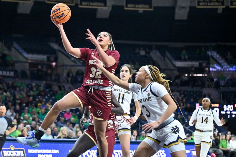 Jan 11, 2024; South Bend, Indiana, USA; Boston College Eagles forward Teya Sidberry (32) goes up for a shot as Notre Dame Fighting Irish guard Hannah Hidalgo (3) defends in the first half at the Purcell Pavilion. Mandatory Credit: Matt Cashore-USA TODAY Sports