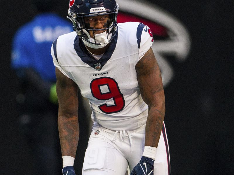 Houston Texans tight end Brevin Jordan (9) lines up during the first half of an NFL football game against the Atlanta Falcons, Sunday, Oct. 8, 2023, in Atlanta. The Atlanta Falcons won 21-19. (AP Photo/Danny Karnik)