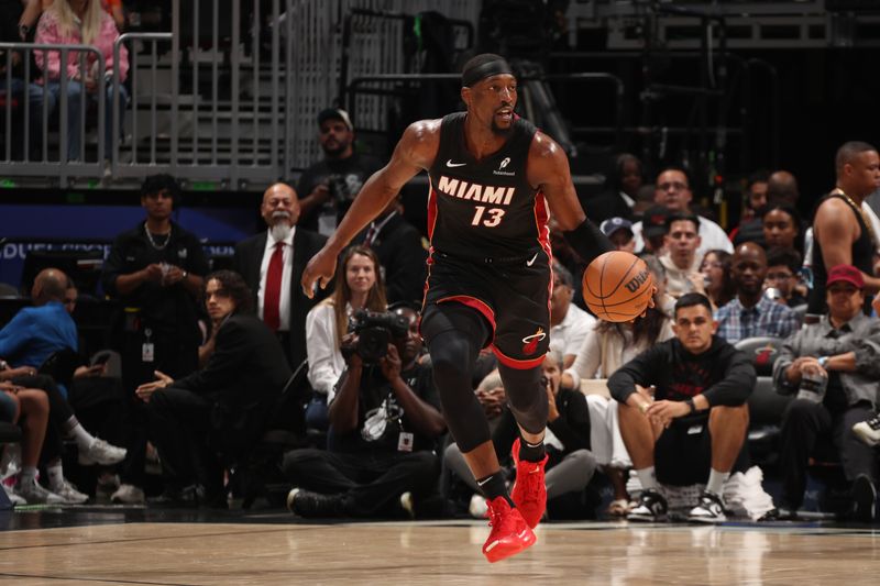 MIAMI, FL - MARCH 2: Bam Adebayo #13 of the Miami Heat dribbles the ball during the game against the New York Knicks on March 2, 2025 at Kaseya Center in Miami, Florida. NOTE TO USER: User expressly acknowledges and agrees that, by downloading and or using this Photograph, user is consenting to the terms and conditions of the Getty Images License Agreement. Mandatory Copyright Notice: Copyright 2025 NBAE (Photo by Issac Baldizon/NBAE via Getty Images)