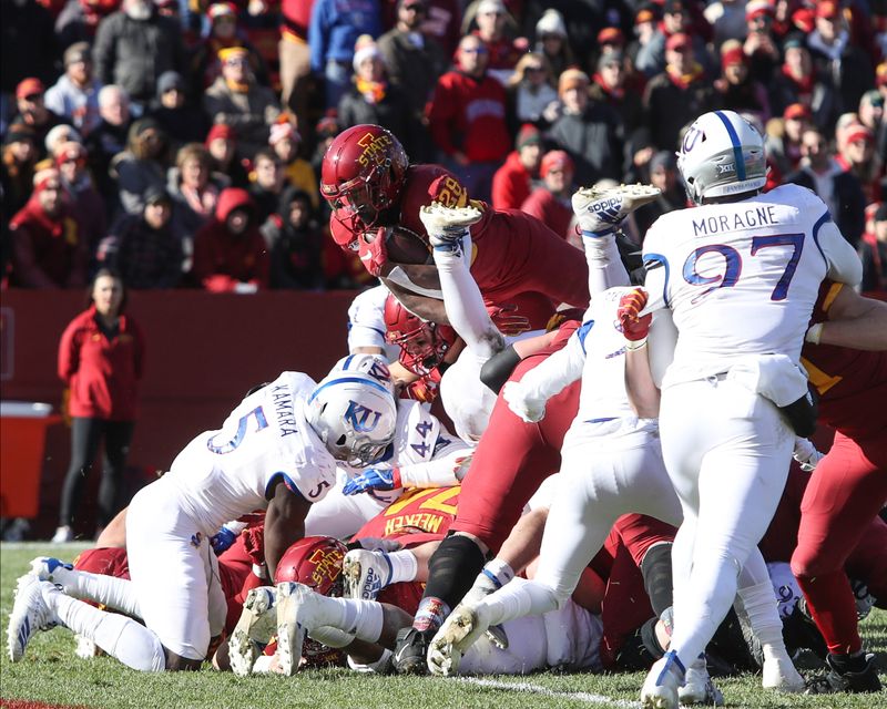 Nov 23, 2019; Ames, IA, USA; Iowa State Cyclones running back Breece Hall (28) dives over the goal line for a touchdown against the Kansas Jayhawks at Jack Trice Stadium. Mandatory Credit: Reese Strickland-USA TODAY Sports