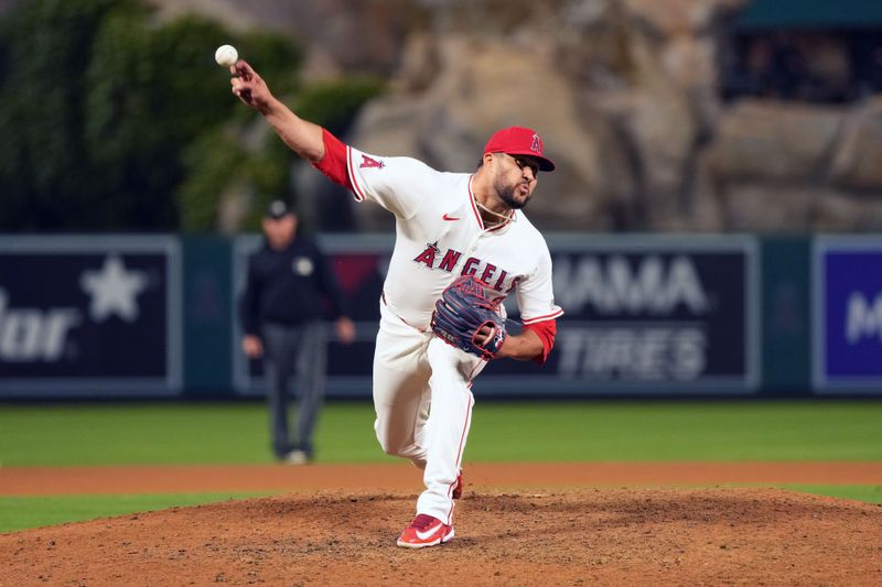 Jun 17, 2024; Anaheim, California, USA; Los Angeles Angels relief pitcher Carlos Estevez (53) throws in the ninth inning against the Milwaukee Brewers at Angel Stadium. Mandatory Credit: Kirby Lee-USA TODAY Sports