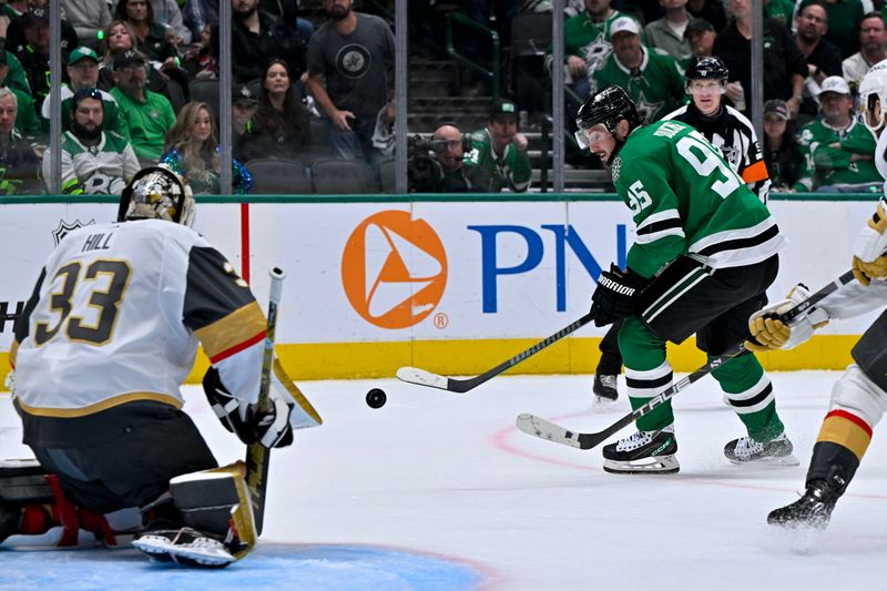 May 5, 2024; Dallas, Texas, USA; Vegas Golden Knights goaltender Adin Hill (33) stops a shot by Dallas Stars center Matt Duchene (95) during the second period in game seven of the first round of the 2024 Stanley Cup Playoffs at American Airlines Center. Mandatory Credit: Jerome Miron-USA TODAY Sports