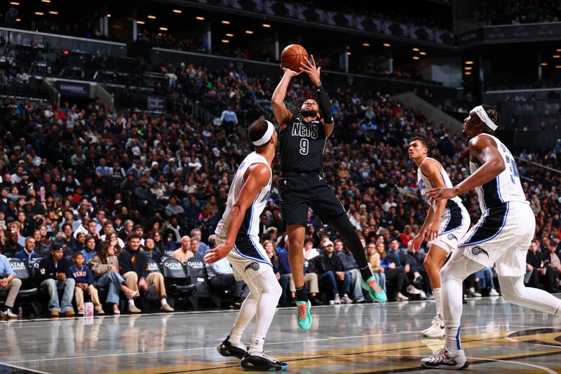 BROOKLYN, NY - NOVEMBER 29: Trendon Watford #9 of the Brooklyn Nets shoots the ball during the game against the Orlando Magic during a Emirates NBA Cup game on October 22, 2024 at Barclays Center in Brooklyn, New York. NOTE TO USER: User expressly acknowledges and agrees that, by downloading and or using this Photograph, user is consenting to the terms and conditions of the Getty Images License Agreement. Mandatory Copyright Notice: Copyright 2024 NBAE (Photo by David L. Nemec/NBAE via Getty Images)