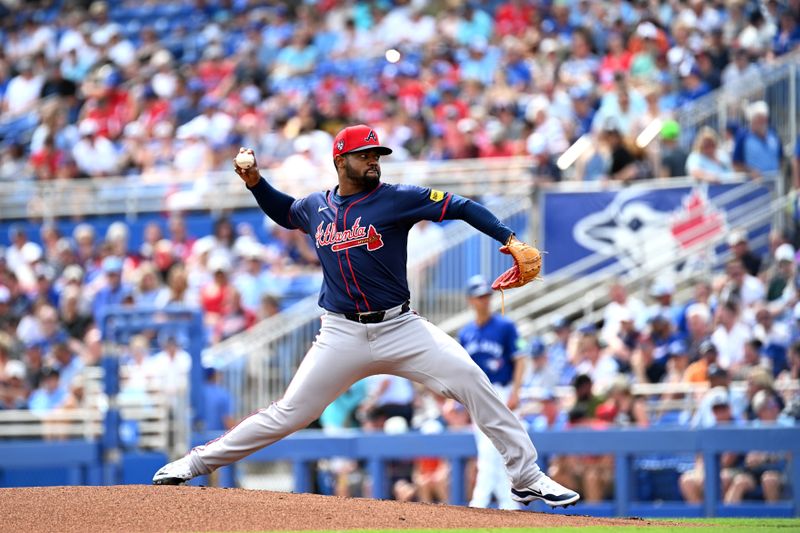 Mar 2, 2024; Dunedin, Florida, USA; Atlanta Braves pitcher Reynaldo Lopez (40) throws a pitch in the first inning of the spring training game against the Toronto Blue Jays at TD Ballpark. Mandatory Credit: Jonathan Dyer-USA TODAY Sports