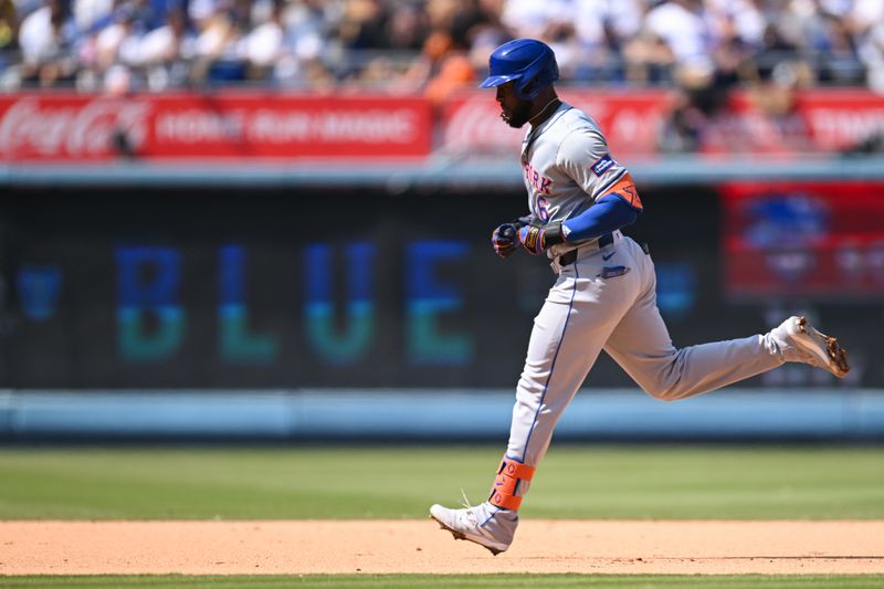 Apr 20, 2024; Los Angeles, California, USA; New York Mets outfielder Starling Marte (6) runs the bases after hitting a home run against the Los Angeles Dodgers during the sixth inning at Dodger Stadium. Mandatory Credit: Jonathan Hui-USA TODAY Sports