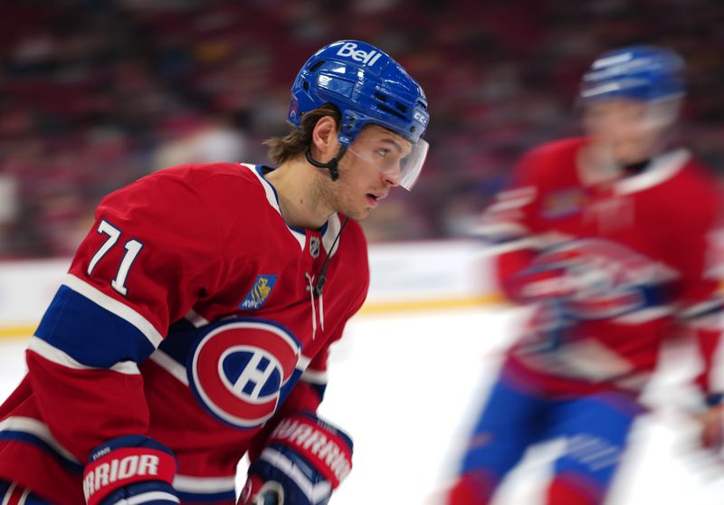 Dec 14, 2025; Montreal, Quebec, CAN; Montreal Canadiens forward Jake Evans (71) skates during the warmup before the game against the Edmonton Oilers at the Bell Centre. Mandatory Credit: Eric Bolte-Imagn Images