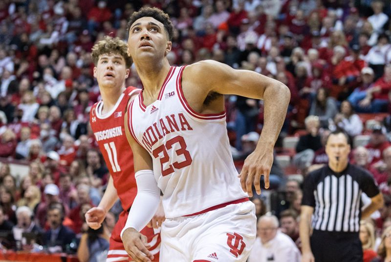 Jan 14, 2023; Bloomington, Indiana, USA; Indiana Hoosiers forward Trayce Jackson-Davis (23) boxes out in the second half against the Wisconsin Badgers at Simon Skjodt Assembly Hall. Mandatory Credit: Trevor Ruszkowski-USA TODAY Sports