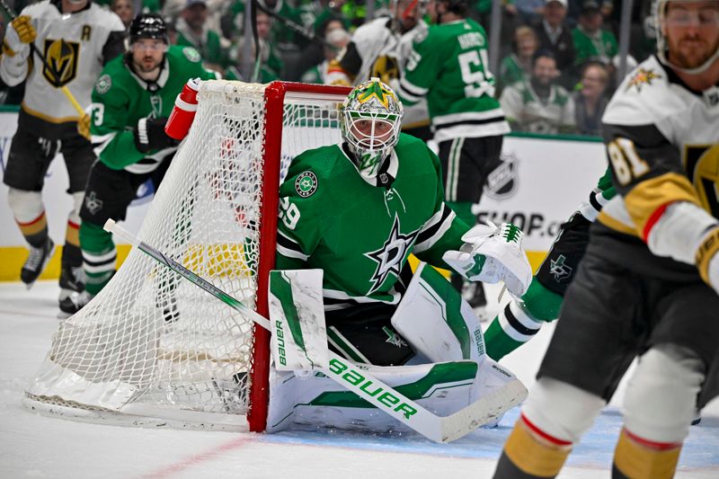 May 1, 2024; Dallas, Texas, USA; Dallas Stars goaltender Jake Oettinger (29) faces the Vegas Golden Knights attack during the third period in game five of the first round of the 2024 Stanley Cup Playoffs at the American Airlines Center. Mandatory Credit: Jerome Miron-USA TODAY Sports