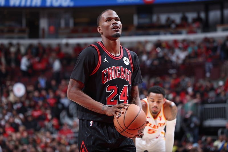 CHICAGO, IL - APRIL 17:  Javonte Green #24 of the Chicago Bulls shoots a free throw during the game against the Atlanta Hawks during the 2024 Play-In Tournament  on April 17, 2024 at United Center in Chicago, Illinois. NOTE TO USER: User expressly acknowledges and agrees that, by downloading and or using this photograph, User is consenting to the terms and conditions of the Getty Images License Agreement. Mandatory Copyright Notice: Copyright 2024 NBAE (Photo by Jeff Haynes/NBAE via Getty Images)