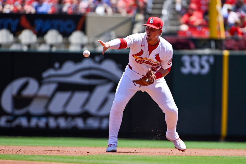 Jun 13, 2024; St. Louis, Missouri, USA;  St. Louis Cardinals second baseman Nolan Gorman (16) flips to second base during the second inning against the Pittsburgh Pirates at Busch Stadium. Mandatory Credit: Jeff Curry-USA TODAY Sports