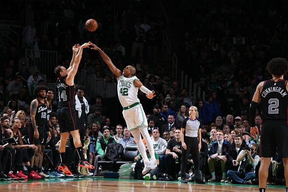 BOSTON, MA - DECEMBER 28: Alec Burks #14 of the Detroit Pistons shoots the ball while Al Horford #42 of the Boston Celtics goes for the block during the game on December 28, 2023 at the TD Garden in Boston, Massachusetts. NOTE TO USER: User expressly acknowledges and agrees that, by downloading and or using this photograph, User is consenting to the terms and conditions of the Getty Images License Agreement. Mandatory Copyright Notice: Copyright 2023 NBAE  (Photo by Brian Babineau/NBAE via Getty Images)