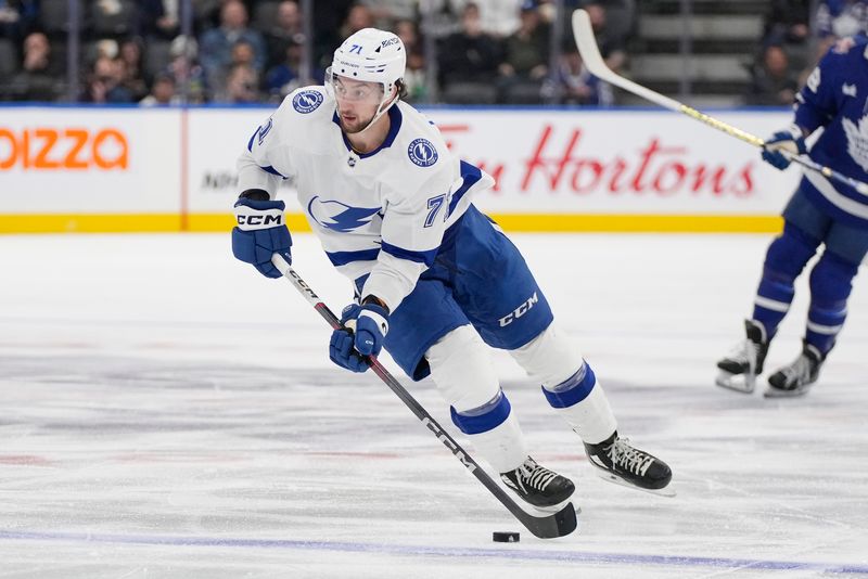 Nov 6, 2023; Toronto, Ontario, CAN; Tampa Bay Lightning forward Anthony Cirelli (71) carries the puck against the Toronto Maple Leafs during the second period at Scotiabank Arena. Mandatory Credit: John E. Sokolowski-USA TODAY Sports