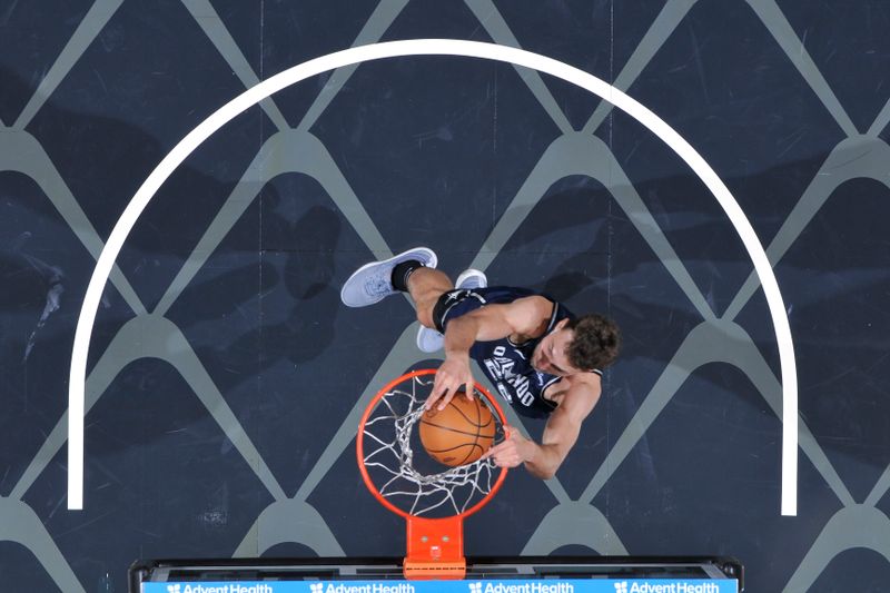 ORLANDO, FL - MARCH 21: Franz Wagner #22 of the Orlando Magic dunks the ball during the game against the New Orleans Pelicans on March 21, 2024 at Amway Center in Orlando, Florida. NOTE TO USER: User expressly acknowledges and agrees that, by downloading and or using this photograph, User is consenting to the terms and conditions of the Getty Images License Agreement. Mandatory Copyright Notice: Copyright 2024 NBAE (Photo by Fernando Medina/NBAE via Getty Images)