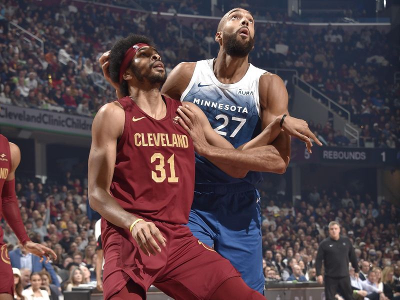 CLEVELAND, OH - MARCH 8: Jarrett Allen #31 of the Cleveland Cavaliers and Rudy Gobert #27 of the Minnesota Timberwolves wait for a rebound during the game on March 8, 2024 at Rocket Mortgage FieldHouse in Cleveland, Ohio. NOTE TO USER: User expressly acknowledges and agrees that, by downloading and/or using this Photograph, user is consenting to the terms and conditions of the Getty Images License Agreement. Mandatory Copyright Notice: Copyright 2024 NBAE (Photo by David Liam Kyle/NBAE via Getty Images)