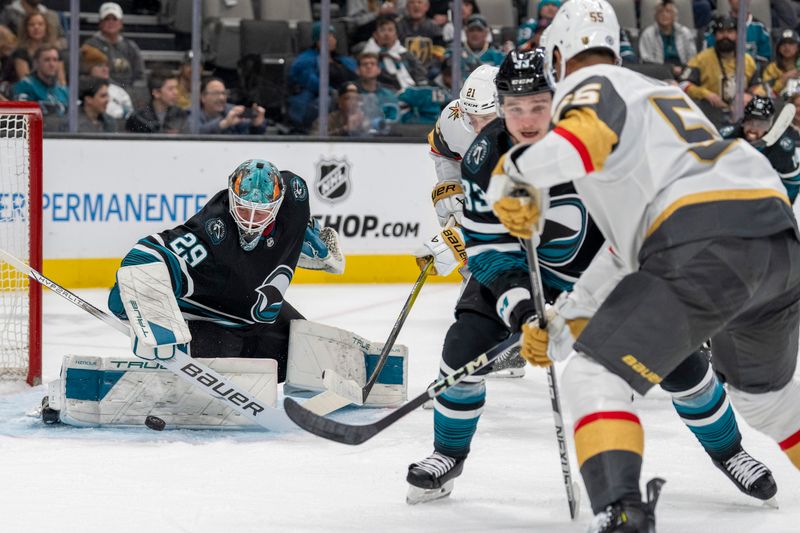 Feb 19, 2024; San Jose, California, USA; San Jose Sharks goalie Mackenzie Blackwood (29) makes a save against Vegas Golden Knights right wing Keegan Kolesar (55) during the first period at SAP Center at San Jose. Mandatory Credit: Neville E. Guard-USA TODAY Sports