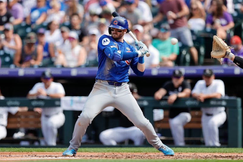 Sep 15, 2024; Denver, Colorado, USA; Chicago Cubs left fielder Ian Happ (8) leans away from a pitch in the third inning against the Colorado Rockies at Coors Field. Mandatory Credit: Isaiah J. Downing-Imagn Images