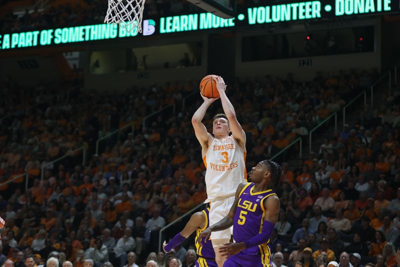 Feb 7, 2024; Knoxville, Tennessee, USA; Tennessee Volunteers guard Dalton Knecht (3) shoots the ball against LSU Tigers forward Mwani Wilkinson (5) during the second half at Thompson-Boling Arena at Food City Center. Mandatory Credit: Randy Sartin-USA TODAY Sports