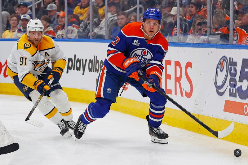 Jan 6, 2026; Edmonton, Alberta, CAN; Edmonton Oilers forward Mattias Janmark (13) looks to make a pass in front of Nashville Predators forward Steven Stamkos (91) during the third period at Rogers Place. Mandatory Credit: Perry Nelson-Imagn Images