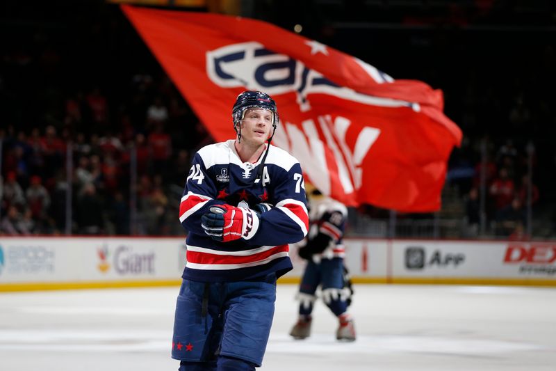 Jan 7, 2024; Washington, District of Columbia, USA; Washington Capitals defenseman John Carlson (74) waves after winning the first star of the game against the Los Angeles Kings at Capital One Arena. Mandatory Credit: Amber Searls-USA TODAY Sports