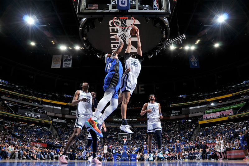 ORLANDO, FL - MARCH 30: Maozinha Pereira #25 of the Memphis Grizzlies drives to the basket during the game against the Orlando Magic on March 30, 2024 at the Kia Center in Orlando, Florida. NOTE TO USER: User expressly acknowledges and agrees that, by downloading and or using this photograph, User is consenting to the terms and conditions of the Getty Images License Agreement. Mandatory Copyright Notice: Copyright 2024 NBAE (Photo by Fernando Medina/NBAE via Getty Images)