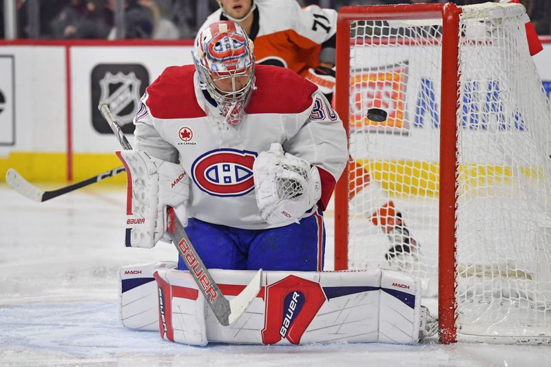 Jan 10, 2024; Philadelphia, Pennsylvania, USA; Montreal Canadiens goaltender Cayden Primeau (30) makes a save against the Philadelphia Flyers during the first period at Wells Fargo Center. Mandatory Credit: Eric Hartline-USA TODAY Sports