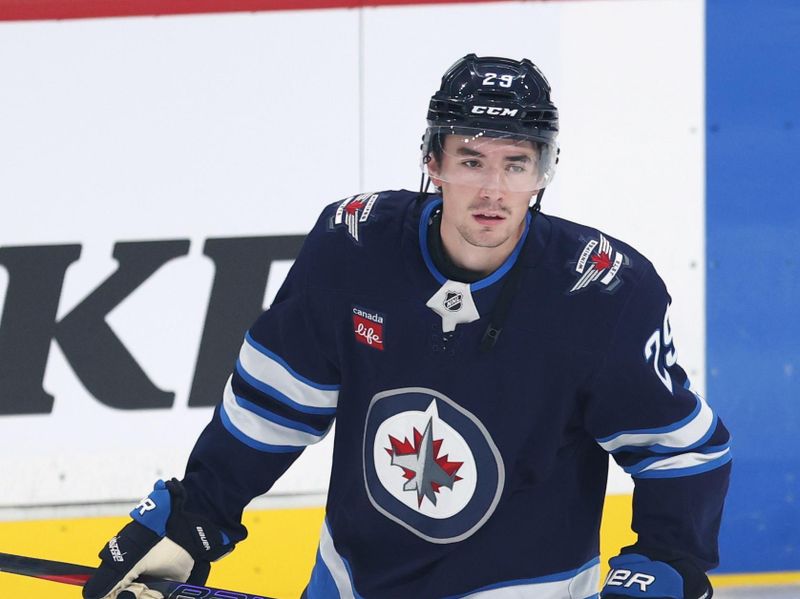 Sep 21, 2025; Winnipeg, Manitoba, CAN; Winnipeg Jets center Brayden Yager (29) warms up before a game against the Minnesota Wild at Canada Life Centre. Mandatory Credit: James Carey Lauder-Imagn Images