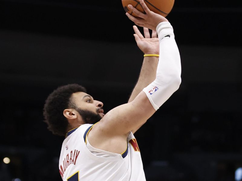 DENVER, COLORADO - FEBRUARY 28: Jamal Murray #27 of the Denver Nuggets shoots against the Sacramento Kings at Ball Arena on February 28, 2024 in Denver, Colorado. NOTE TO USER: User expressly acknowledges and agrees that, by downloading and or using this photograph, User is consenting to the terms and conditions of the Getty Images License Agreement. (Photo by Brendall O'Banon/Clarkson Creative/Getty Images)