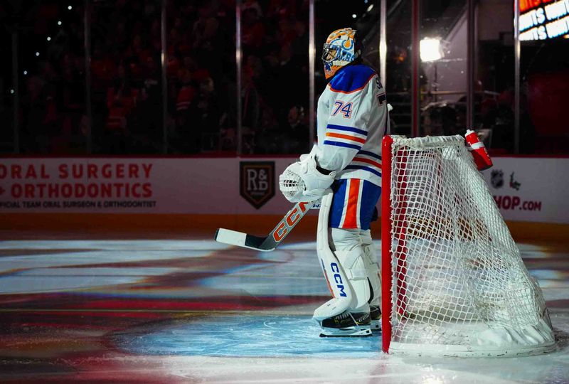 Nov 22, 2023; Raleigh, North Carolina, USA; Edmonton Oilers goaltender Stuart Skinner (74) looks on before the start of the game against the Carolina Hurricanes at PNC Arena. Mandatory Credit: James Guillory-USA TODAY Sports