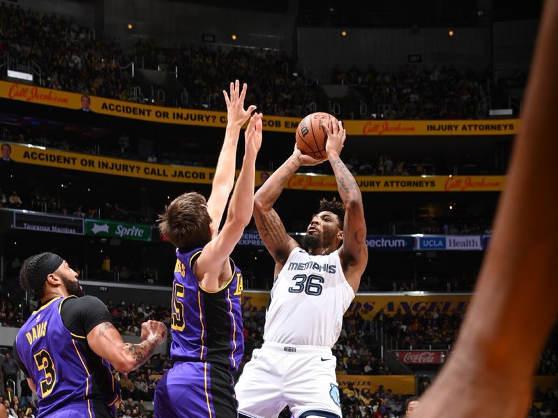 LOS ANGELES, CA - JANUARY 5:  Marcus Smart #36 of the Memphis Grizzlies shoots the ball during the game  on January 5, 2024 at Crypto.Com Arena in Los Angeles, California. NOTE TO USER: User expressly acknowledges and agrees that, by downloading and/or using this Photograph, user is consenting to the terms and conditions of the Getty Images License Agreement. Mandatory Copyright Notice: Copyright 2024 NBAE (Photo by Andrew D. Bernstein/NBAE via Getty Images)