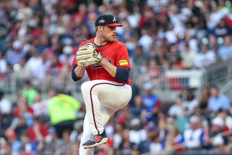 Apr 18, 2025; Cumberland, Georgia, USA; Atlanta Braves pitcher Bryce Elder (55) pitches against the Minnesota Twins during the second inning at Truist Park. Mandatory Credit: Jordan Godfree-Imagn Images