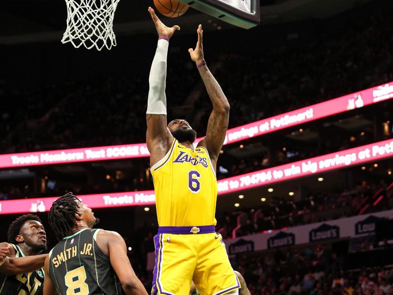 CHARLOTTE, NC - JANUARY 2: LeBron James #6 of the Los Angeles Lakers drives to the basket against the Charlotte Hornets on January 2, 2023 at Spectrum Center in Charlotte, North Carolina. NOTE TO USER: User expressly acknowledges and agrees that, by downloading and or using this photograph, User is consenting to the terms and conditions of the Getty Images License Agreement. Mandatory Copyright Notice: Copyright 2023 NBAE (Photo by Brock Williams-Smith/NBAE via Getty Images)