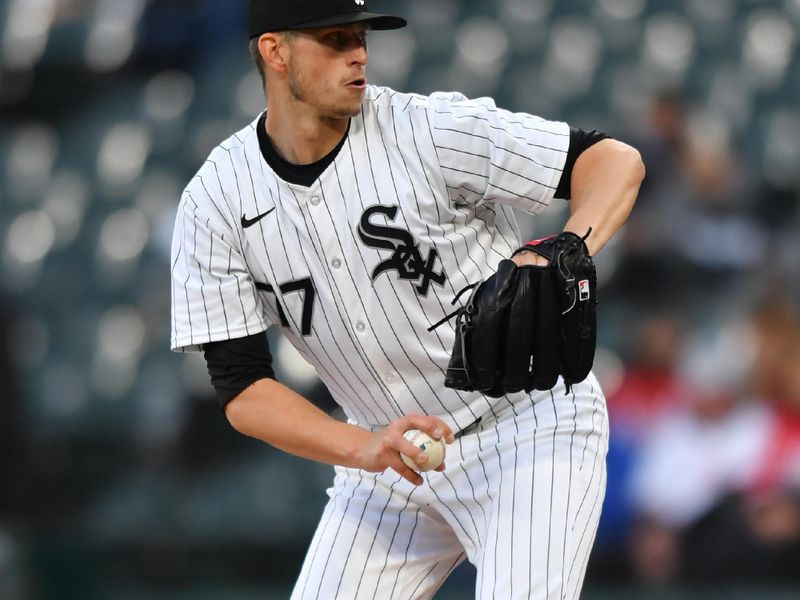 Apr 12, 2024; Chicago, Illinois, USA; Chicago White Sox starting pitcher Chris Flexen (77) pitches during the first inning against the Cincinnati Reds at Guaranteed Rate Field. Mandatory Credit: Patrick Gorski-USA TODAY Sports