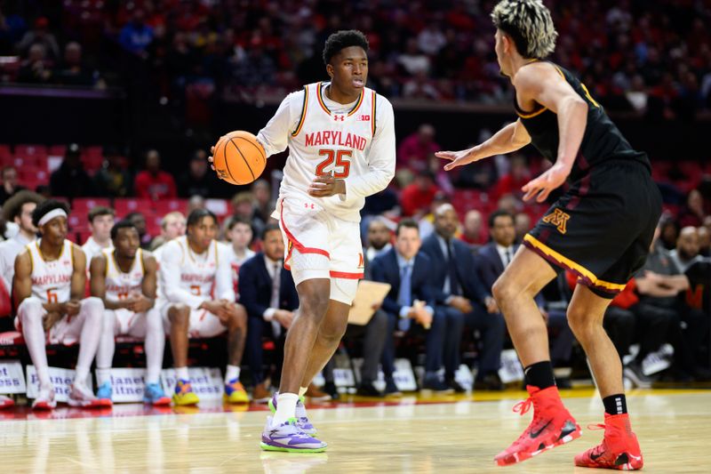 Jan 13, 2025; College Park, Maryland, USA; Maryland Terrapins center Derik Queen (25) handles the ball against Minnesota Golden Gophers forward Dawson Garcia (3) during the second half at Xfinity Center. Mandatory Credit: Reggie Hildred-Imagn Images