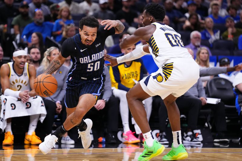 ORLANDO, FLORIDA - OCTOBER 28: Cole Anthony #50 of the Orlando Magic dribbles the ball against Bennedict Mathurin #00 of the Indiana Pacers during the second quarter at Kia Center on October 28, 2024 in Orlando, Florida. NOTE TO USER: User expressly acknowledges and agrees that, by downloading and or using this photograph, User is consenting to the terms and conditions of the Getty Images License Agreement. (Photo by Rich Storry/Getty Images)