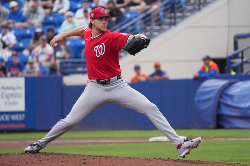 Feb 28, 2026; Port St. Lucie, Florida, USA;  Washington Nationals pitcher Jake Irvin (27) pitches in the first inning against the New York Mets at Clover Park. Mandatory Credit: Jim Rassol-Imagn Images