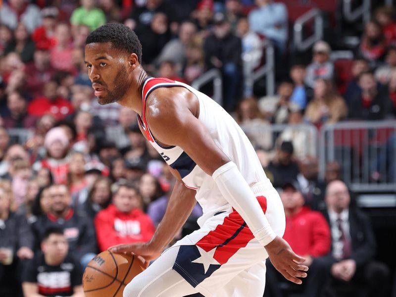 CHICAGO, IL - MARCH 25:  Jared Butler #4 of the Washington Wizards dribbles the ball during the game against the Chicago Bulls on March 25, 2024 at United Center in Chicago, Illinois. NOTE TO USER: User expressly acknowledges and agrees that, by downloading and or using this photograph, User is consenting to the terms and conditions of the Getty Images License Agreement. Mandatory Copyright Notice: Copyright 2024 NBAE (Photo by Jeff Haynes/NBAE via Getty Images)