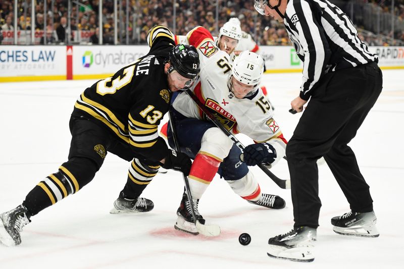 May 17, 2024; Boston, Massachusetts, USA; Boston Bruins center Charlie Coyle (13) and Florida Panthers center Anton Lundell (15) battle for the puck during the second period in game six of the second round of the 2024 Stanley Cup Playoffs at TD Garden. Mandatory Credit: Bob DeChiara-USA TODAY Sports