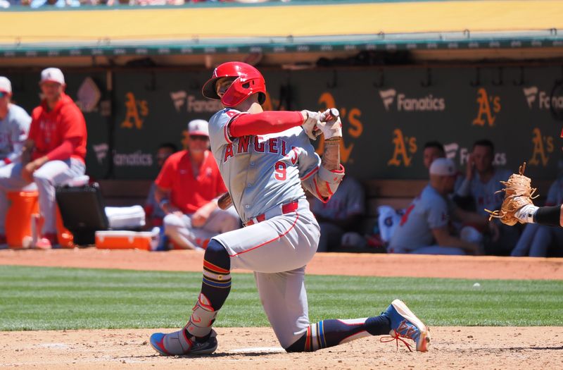 Jul 4, 2024; Oakland, California, USA; Los Angeles Angels shortstop Zach Neto (9) strikes out against the Oakland Athletics during the fourth inning at Oakland-Alameda County Coliseum. Mandatory Credit: Kelley L Cox-USA TODAY Sports