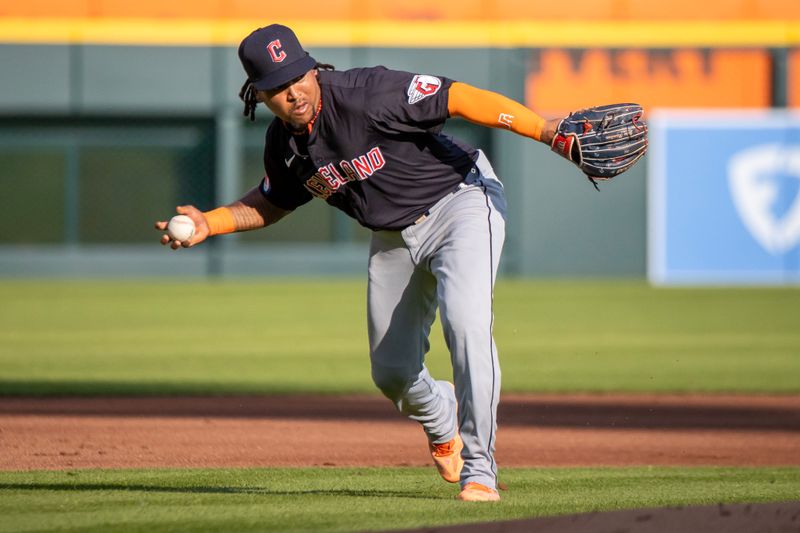 Jul 8, 2024; Detroit, Michigan, USA; Cleveland Guardians third base José Ramírez (11) makes a throw to first base in the first inning against the Detroit Tigers at Comerica Park. Mandatory Credit: David Reginek-USA TODAY Sports