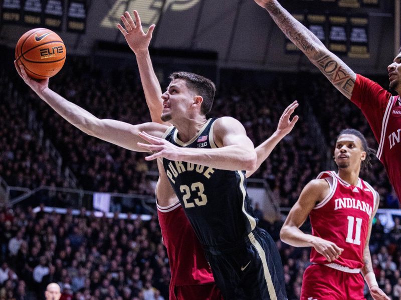 Feb 10, 2024; West Lafayette, Indiana, USA; Purdue Boilermakers forward Camden Heide (23)  shoots the ball while Indiana Hoosiers guard Anthony Leal (3) defends in the second half at Mackey Arena. Mandatory Credit: Trevor Ruszkowski-USA TODAY Sports