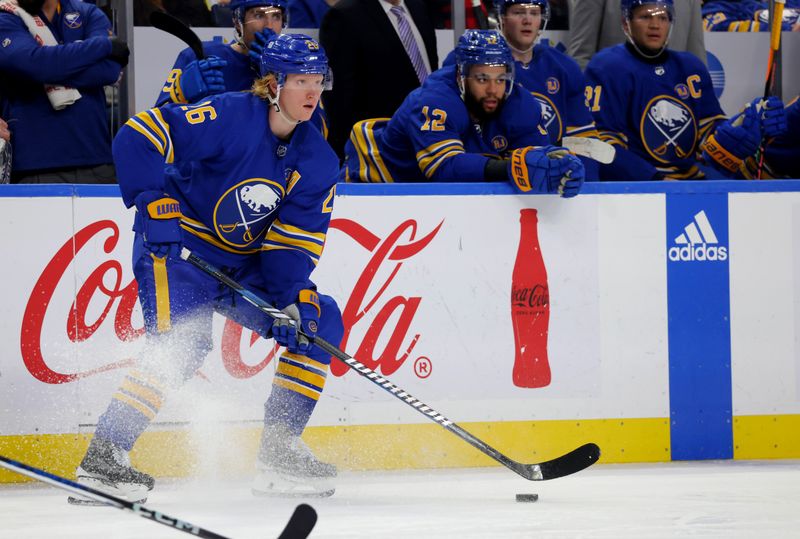 Dec 30, 2023; Buffalo, New York, USA;  Buffalo Sabres defenseman Rasmus Dahlin (26) looks to make a pass during the second period against the Columbus Blue Jackets at KeyBank Center. Mandatory Credit: Timothy T. Ludwig-USA TODAY Sports