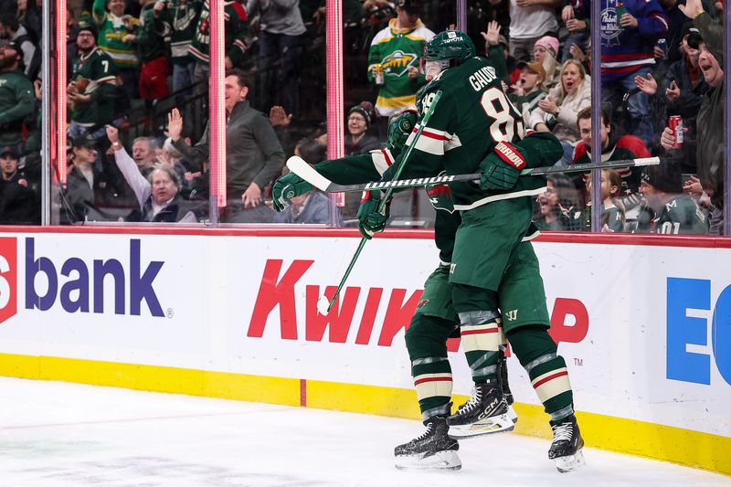 Dec 3, 2024; Saint Paul, Minnesota, USA; Minnesota Wild center Frederick Gaudreau (89) celebrates his goal with left wing Marcus Foligno (17) during the second period against the Vancouver Canucks at Xcel Energy Center. Mandatory Credit: Matt Krohn-Imagn Images