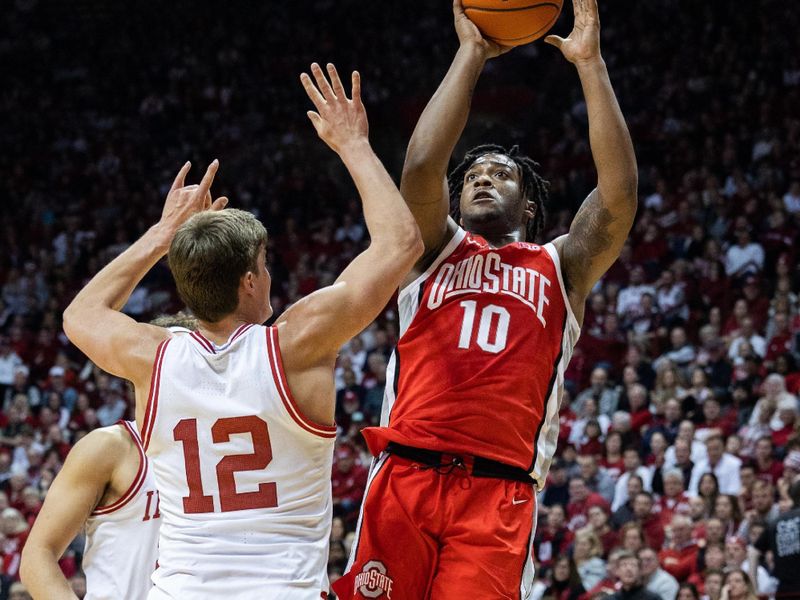 Jan 28, 2023; Bloomington, Indiana, USA; Ohio State Buckeyes forward Brice Sensabaugh (10) shoots the ball while Indiana Hoosiers forward Miller Kopp (12) defends in the second half  at Simon Skjodt Assembly Hall. Mandatory Credit: Trevor Ruszkowski-USA TODAY Sports