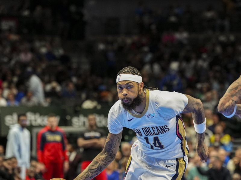 DALLAS, TX - November 19: Brandon Ingram #14 of the New Orleans Pelicans drives to the basket during the NBA Cup game against the Dallas Mavericks on November 19, 2024 at American Airlines Center in Dallas, Texas. NOTE TO USER: User expressly acknowledges and agrees that, by downloading and or using this photograph, User is consenting to the terms and conditions of the Getty Images License Agreement. Mandatory Copyright Notice: Copyright 2024 NBAE (Photo by Glenn James/NBAE via Getty Images)